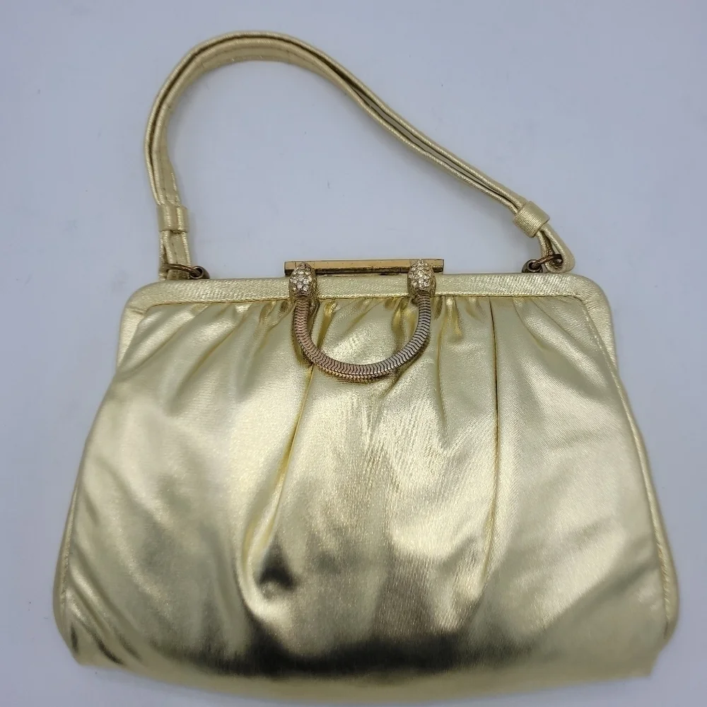 Vintage Andé Gold Clutch With Rhinestone Details Clasp.
